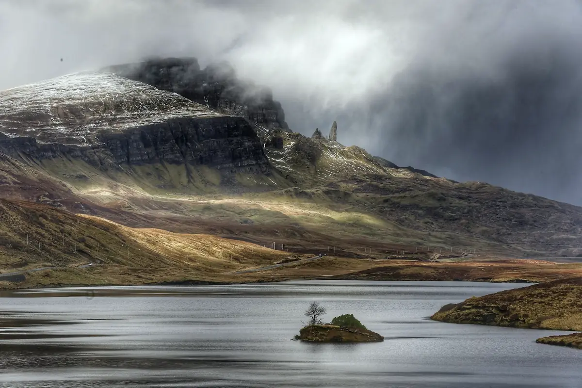 Aerial view of a loch and mountain ridge