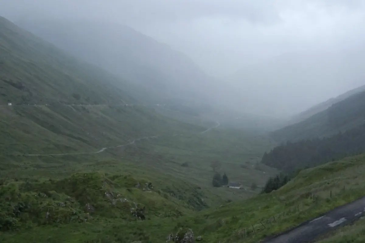 A single road running along a mountain valley